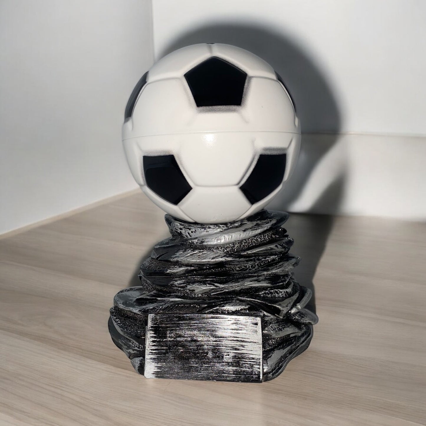 Trofeo Pallone da calcio su roccia